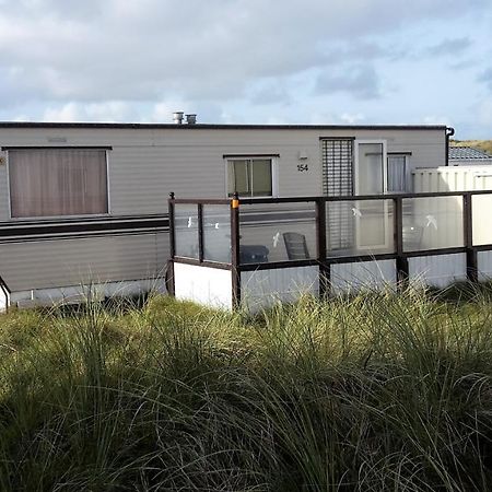 Ameland-Nes-Duinoord: Stacaravan Nes  Bagian luar foto