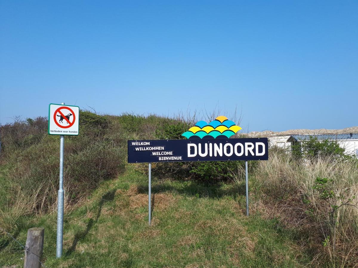 Ameland-Nes-Duinoord: Stacaravan Nes  Bagian luar foto